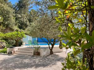 Villas Charmante Villa Botanique a Vaison-La-Romaine avec vue sur le chateau du village : photos des chambres