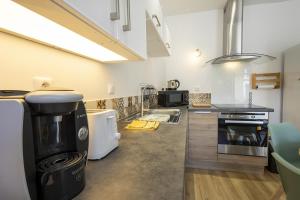 Appartements L'Emeraude - 1 a 4P - Wifi Fibre - Parking Gratuit : photos des chambres