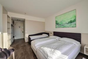 Triple Room with Balcony room in Hotel Luna Garni