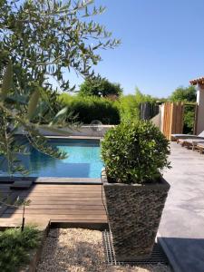 Maisons de vacances Charmante villa avec piscine privee : photos des chambres