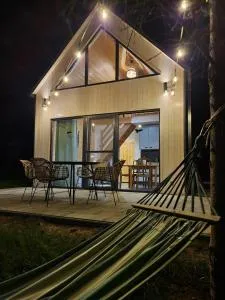 Żywiołowo - domki w stylu stodoły z placem zabaw i stawem - ZIEMIA - Mokrzyn