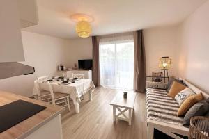 Appartements 7mn de Deauville Jardin Wifi Box TV : photos des chambres