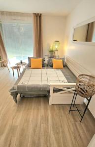 Appartements 7mn de Deauville Jardin Wifi Box TV : photos des chambres