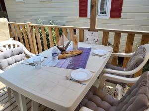 Appartements AU 120 Grand mobilhome clim : photos des chambres