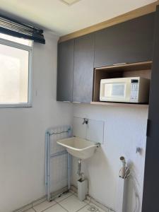 Apartamento em condomínio aconchegante com piscina