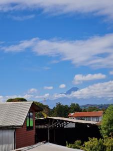 Habitación con baño privado vista al volcán