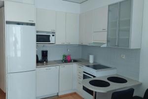 Top location apartment with balcony and sauna Kotimaailma Apartments