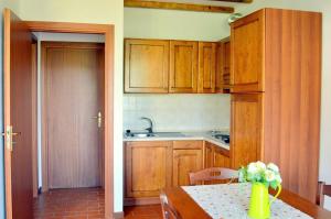 Apartments 4 beds, first floor with private outdoor area, in Residence with swimming-pool