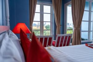 The Frangipani Royal Palace Hotel