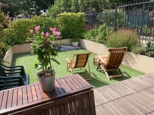 Appartements Loft 3 pieces sur jardin - 15 minutes de Paris avec parking : photos des chambres