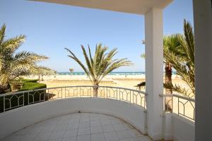 Beach house First Row sea view at Santa Monica next to Almaza Bay