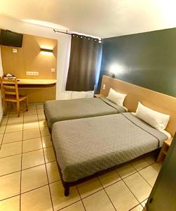 Hotels Confort Hotel : photos des chambres