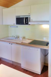 Maisons de vacances Holiday Home Les Cottages du Lac M3 Premium by Interhome : photos des chambres