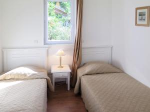 Maisons de vacances Holiday Home Les Cottages du Lac M3 Premium by Interhome : photos des chambres