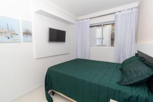 Cardeal 206B - Aconchegante apartamento na praia de Bombas - 2 dormitórios 5 pessoas - (Consultar serviços de roupa de cama e banho)