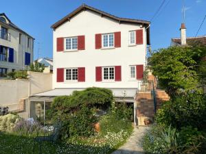 Appartements Appartement spacieux dans maison avec terrasse et jardin : photos des chambres