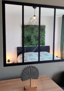 Appartements Jungly / Moderne - Cocooning - Calme - Nature : photos des chambres