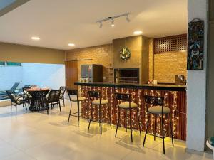 Vila linda com SPA e Piscina a 50 metros da Praia