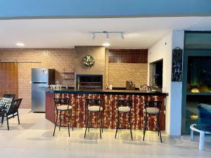 Vila linda com SPA e Piscina a 50 metros da Praia