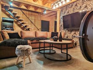 Chalets La fleche 1 de Super Besse - Chalet Prive de Standing avec Jaccuzzi : photos des chambres