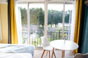 Appartements Cosy Aulnay- Paris Nord - Expo Le Bourget-Expo Villepinte : photos des chambres