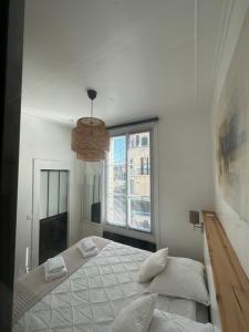 Appartements La Nacre - Logement de charme - Cabourg : photos des chambres