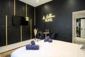 Appartements La Golden Suite : photos des chambres