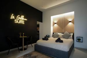 Appartements La Golden Suite : photos des chambres