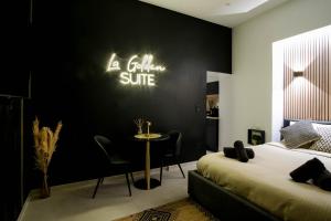 Appartements La Golden Suite : photos des chambres