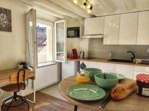 Appartements Au p'tit Lagny - rue pietonne : photos des chambres