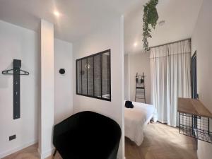 Casa Margery - 8 Charmants Appartements - Hyper Centre Brive : photos des chambres