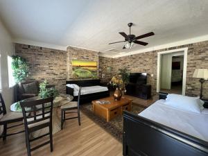 JI13- ,A two bedroom, one bath house with den, covered outdoor dining area and fenced in yard at our Joplin Inn home