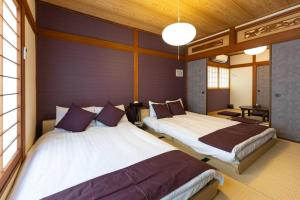 駐車場無料！静かな住宅街　５つの寝室でご家族でゆっくりお過ごし頂けます　7台の寝具で最大14名様まで