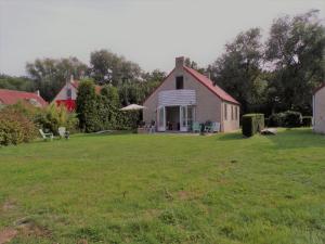 Gezellige vakantiewoning aan het water in Ewijk - recreational only no workers