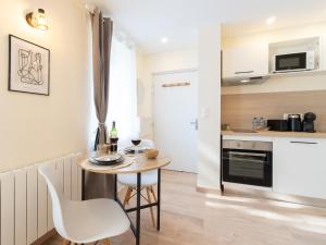 Appartements Le Lotus - Parking public gratuit, wifi haut debit, proche autoroute, gare & centre ville : photos des chambres