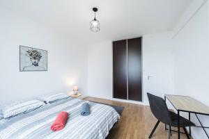 Appartements Evadez-vous au coeur de Tours dans un appartement spacieux offrant une vue paisible sur des jardins luxuriants. : photos des chambres