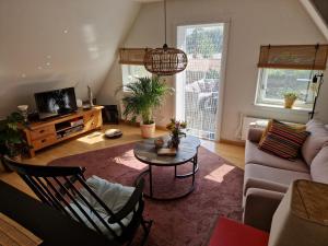 Zonnig appartement Maasbommel.