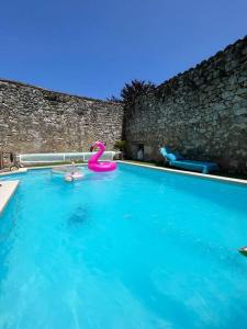 Maisons de vacances Maison de village avec piscine : photos des chambres