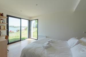 Maisons de vacances TY KOREJOU - splendide maison avec sauna les pieds dans l'eau : photos des chambres