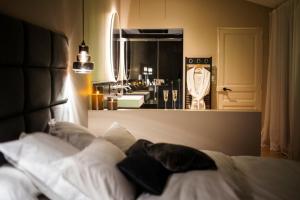 Appartements Hedone Suite de luxe et Spa privatif : photos des chambres