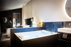 Appartements Hedone Suite de luxe et Spa privatif : photos des chambres