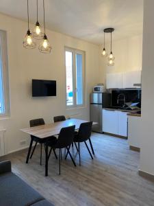 Appartements Maison Saint Exupery : photos des chambres