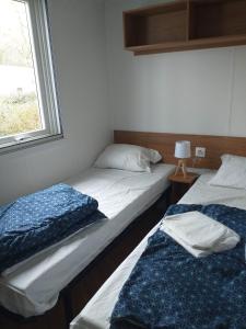 Campings MOBILHOME 3 CHAMBRES GRAND CONFORT : photos des chambres
