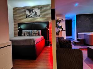 Appartements Le Loft Lens : Jacuzzi - sauna - hammam : photos des chambres