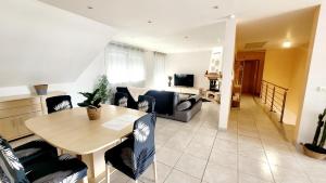 Appartements Logement La Bonbonniere garage et parking gratuit proche frontiere : photos des chambres