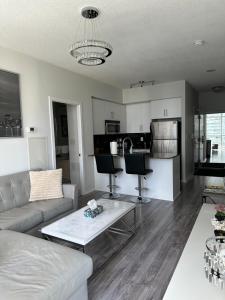 Newly updated 3BR, 2Bath in Downtown Toronto beside Station & Scotia Bank Arena!