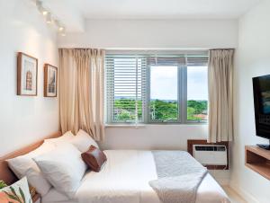 Bright & Cozy Studio Condo in Commonwealth, UP Diliman
