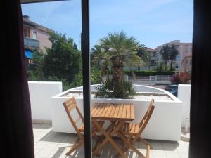 Hotels Hotel Sable Et Soleil - Port, Plage et spa : Chambre Quadruple avec Balcon 