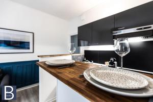 Appartements Le Bataillon - Confort : photos des chambres