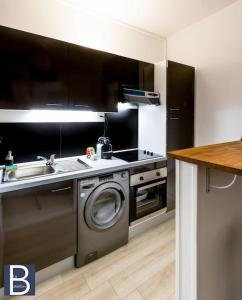 Appartements Le Bataillon - Confort : photos des chambres